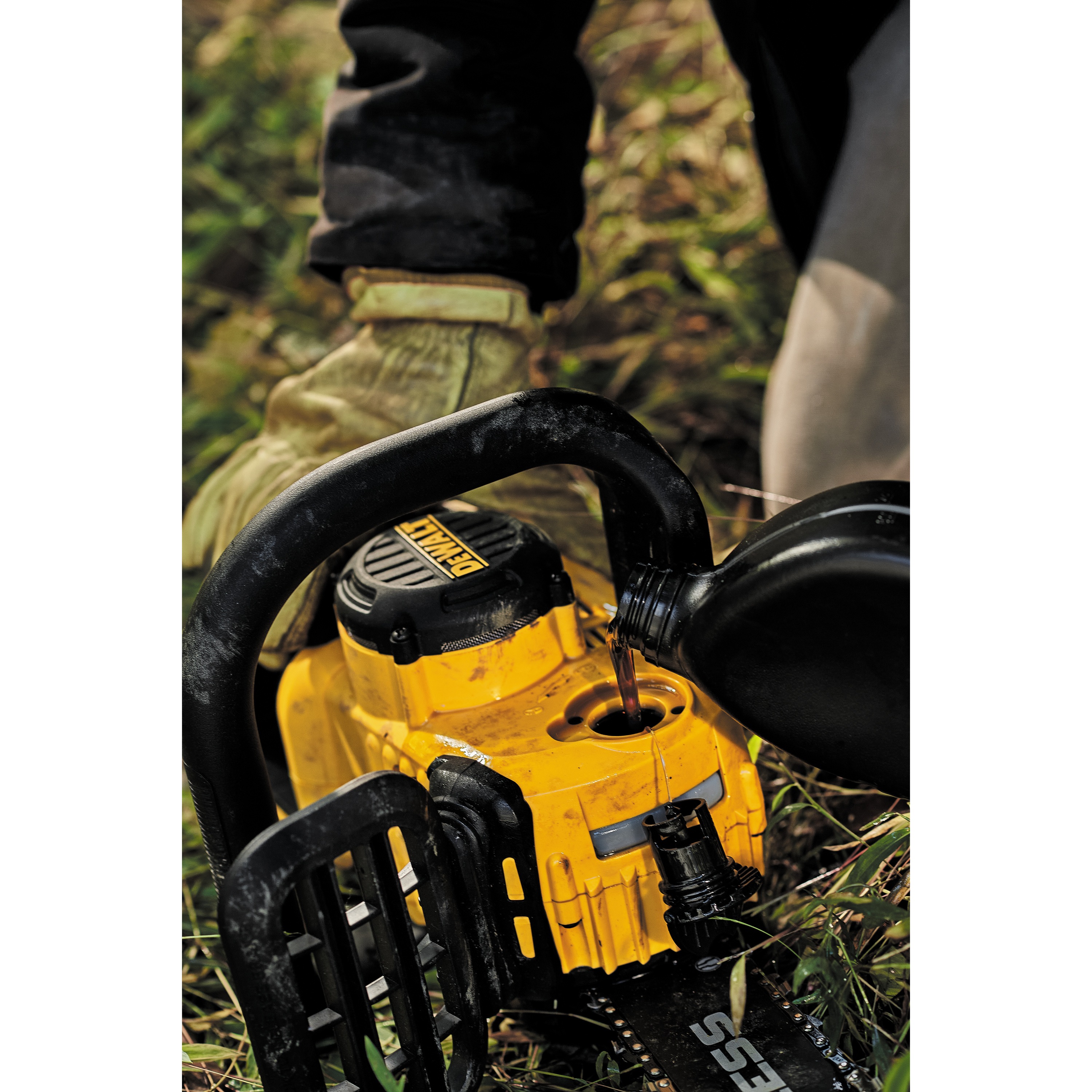 Close up of chain oil fill cap feature of XR® Compact 12  inch Cordless Chainsaw