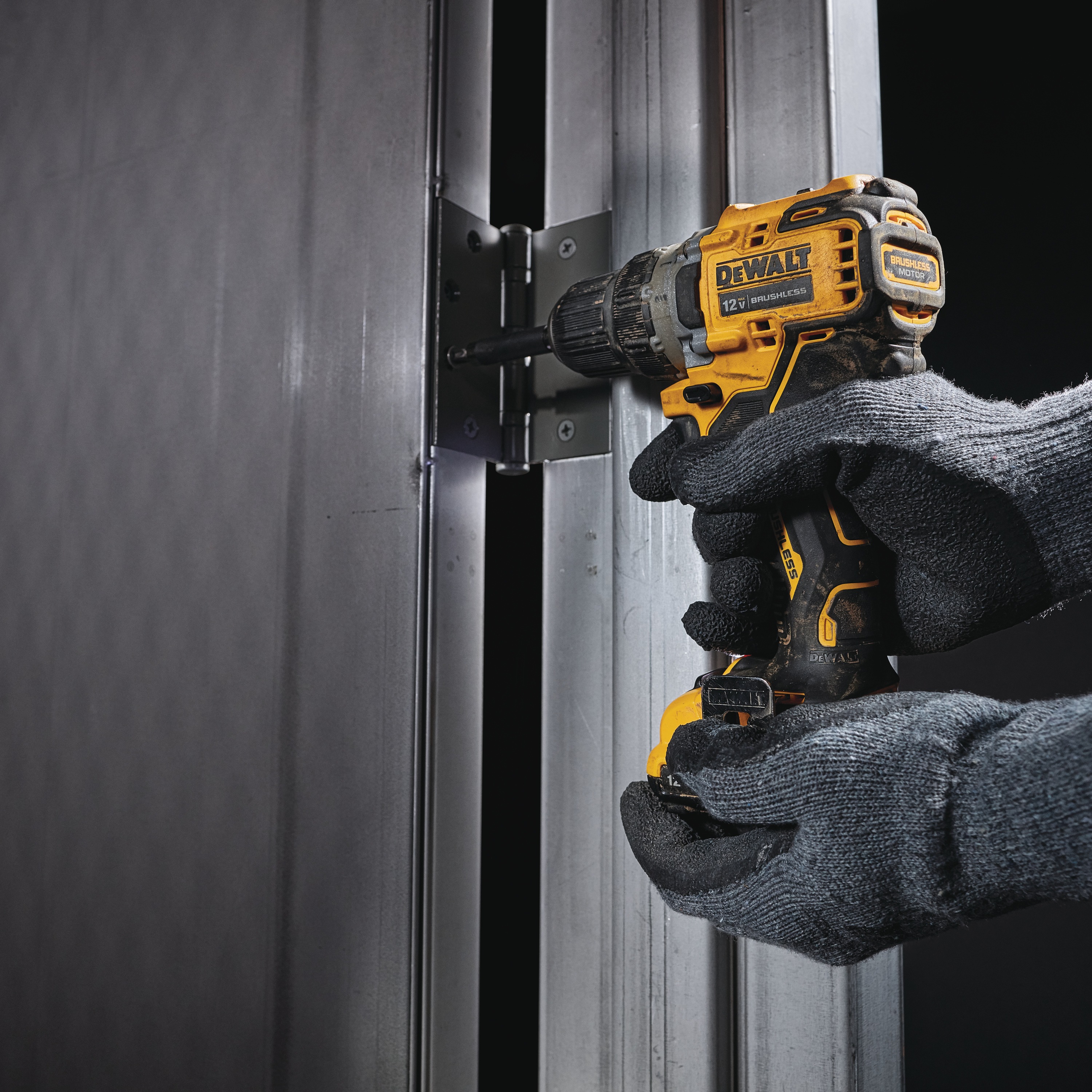 Brushless cordless drill driver drilling  small pilot holes.