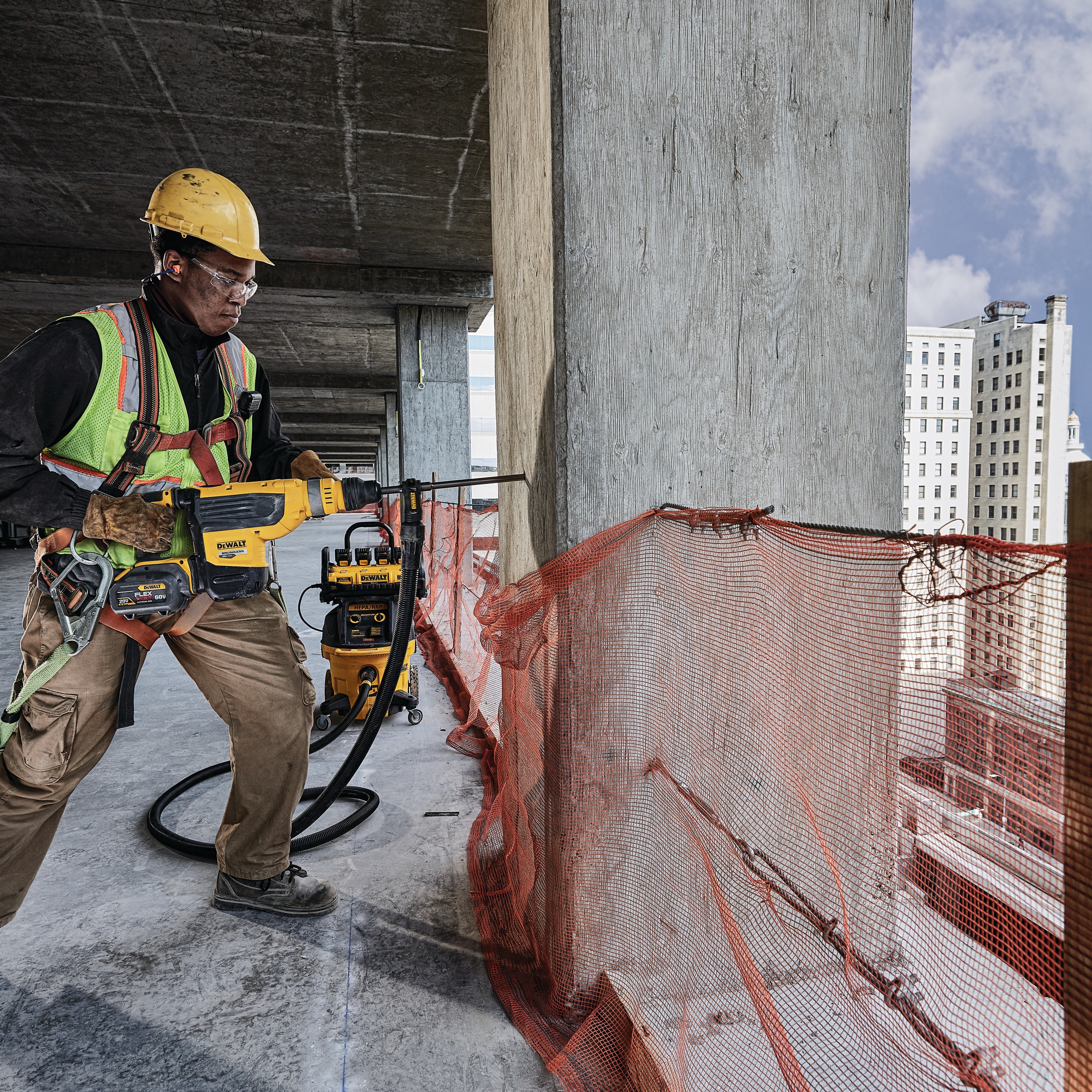 Brushless, cordless SDS MAX combination rotary hammer being used by a person