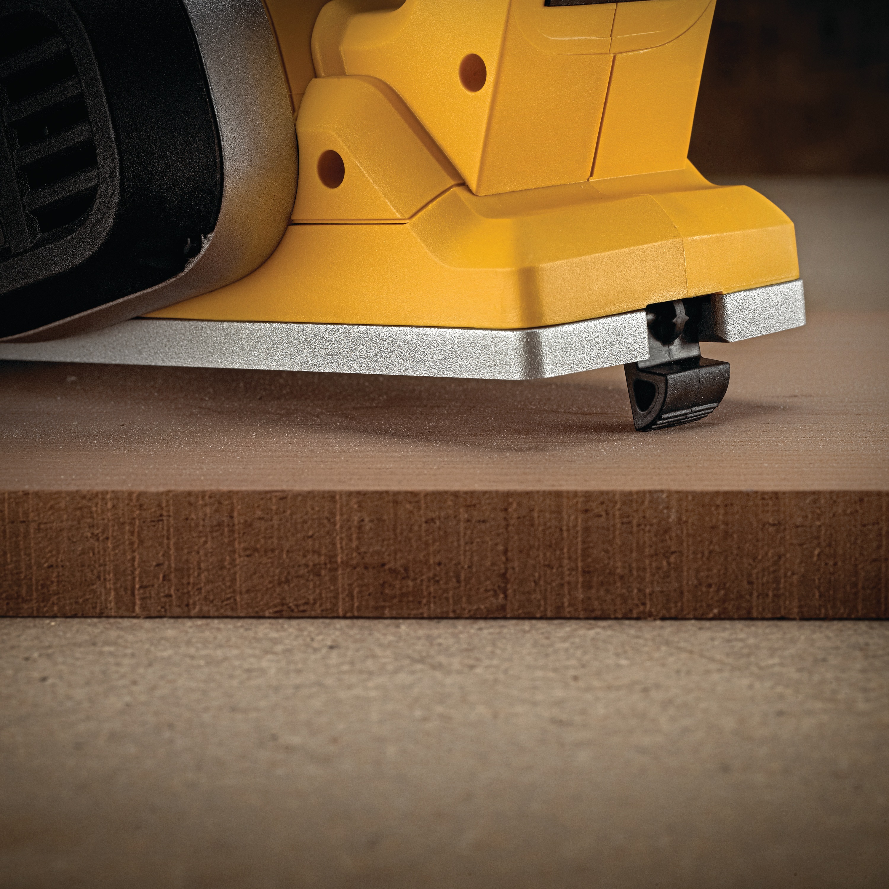 Foot lock-off feature of  Brushless cordless planer.