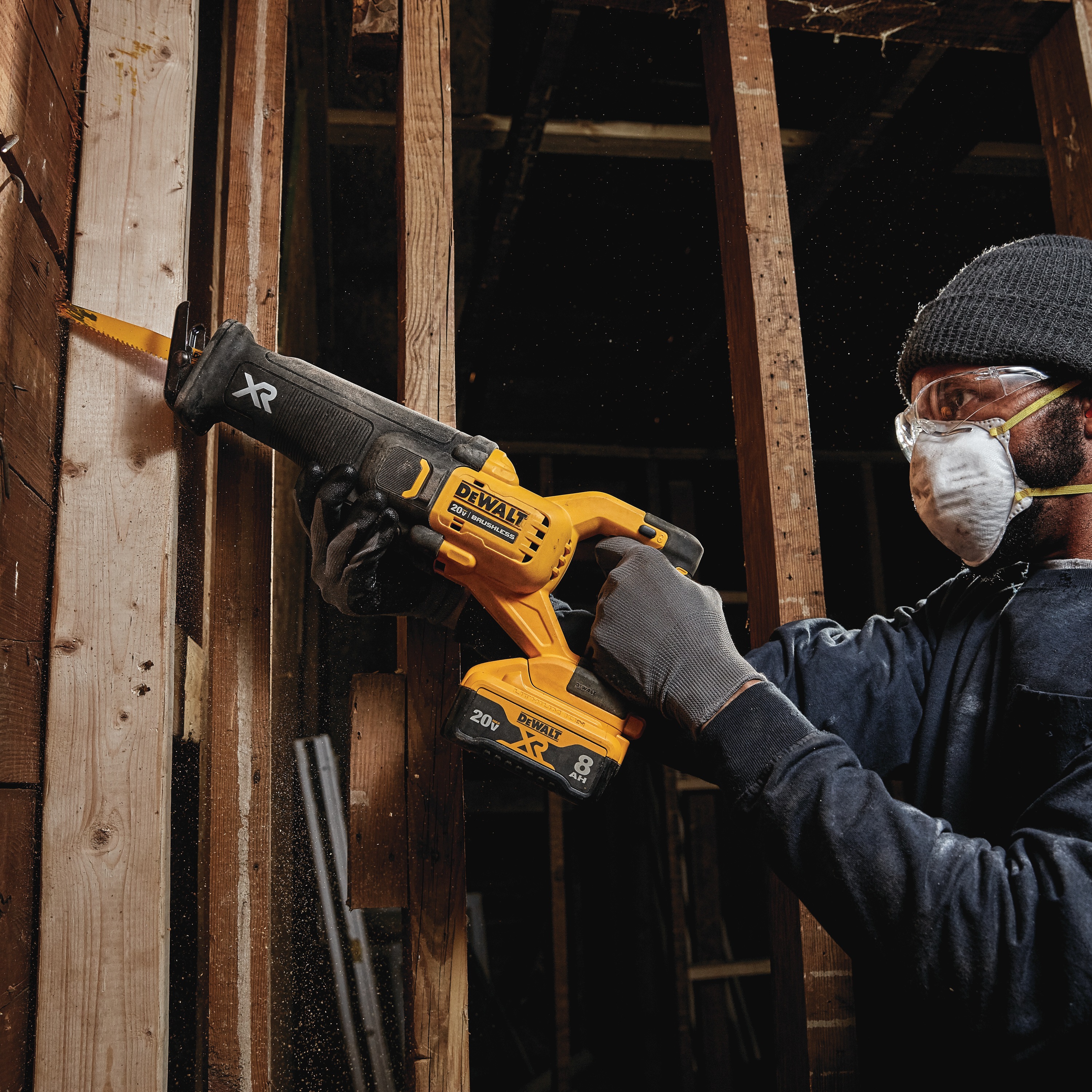 XR BRUSHLESS RECIPROCATING SAW WITH POWER DETECT being used by worker on shiplap
