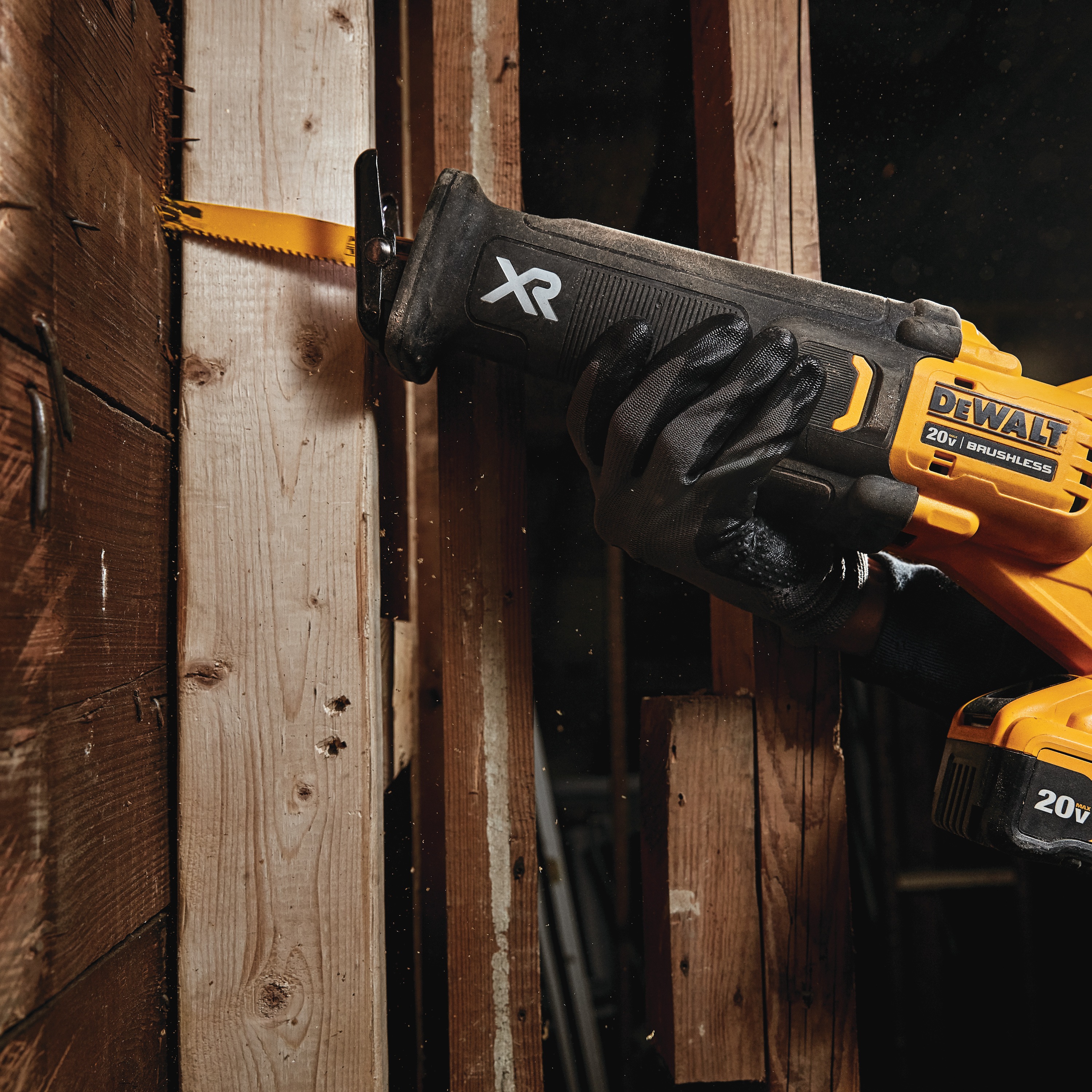 XR BRUSHLESS RECIPROCATING SAW WITH POWER DETECT being used by worker on shiplap