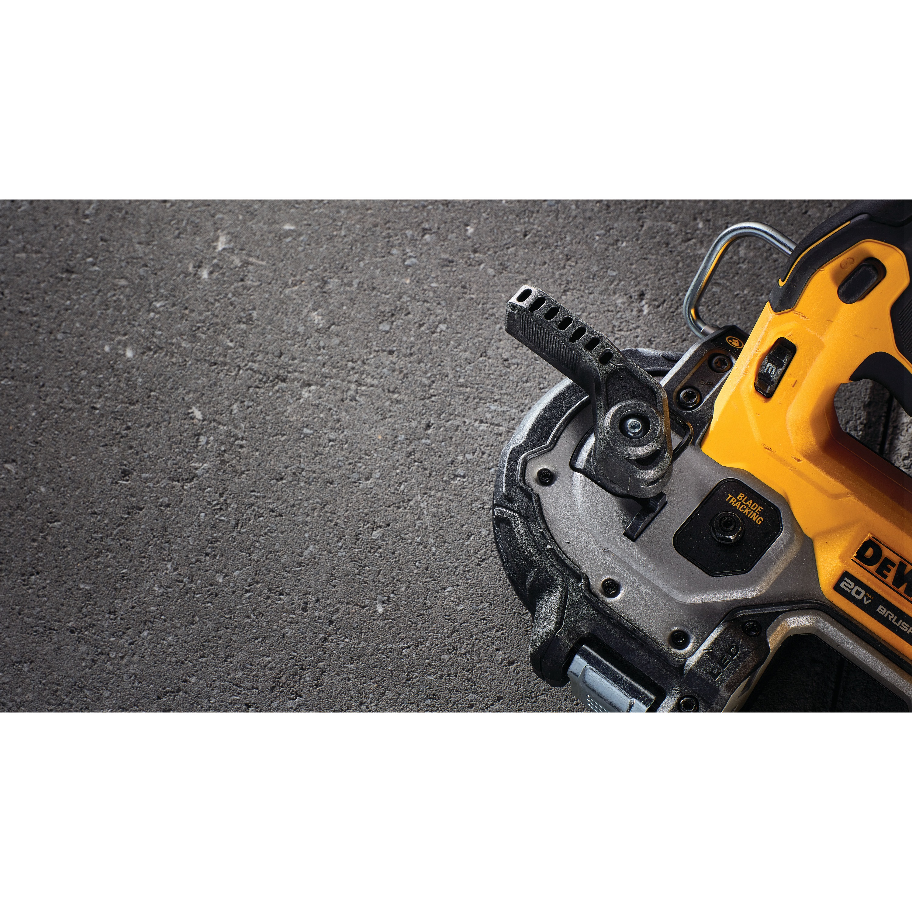 Blade release lever with wrench feature of Brushless Cordless 1 and 3 quarters inch Compact Bandsaw 