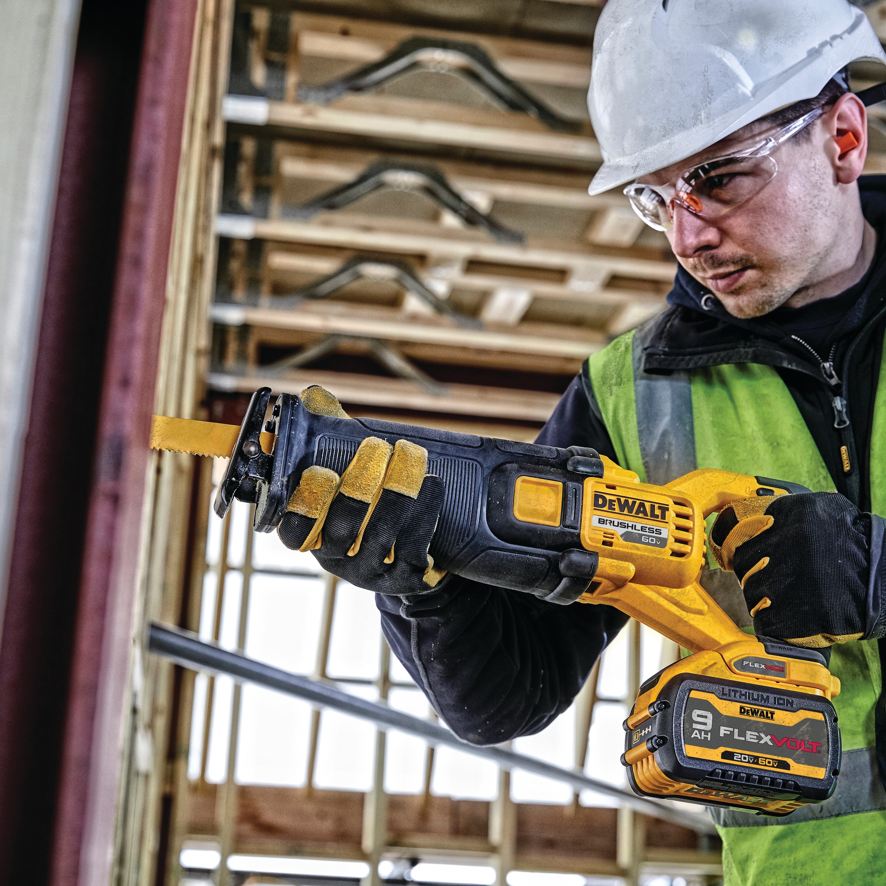 FLEXVOLT brushless cordless reciprocating saw being used by person.