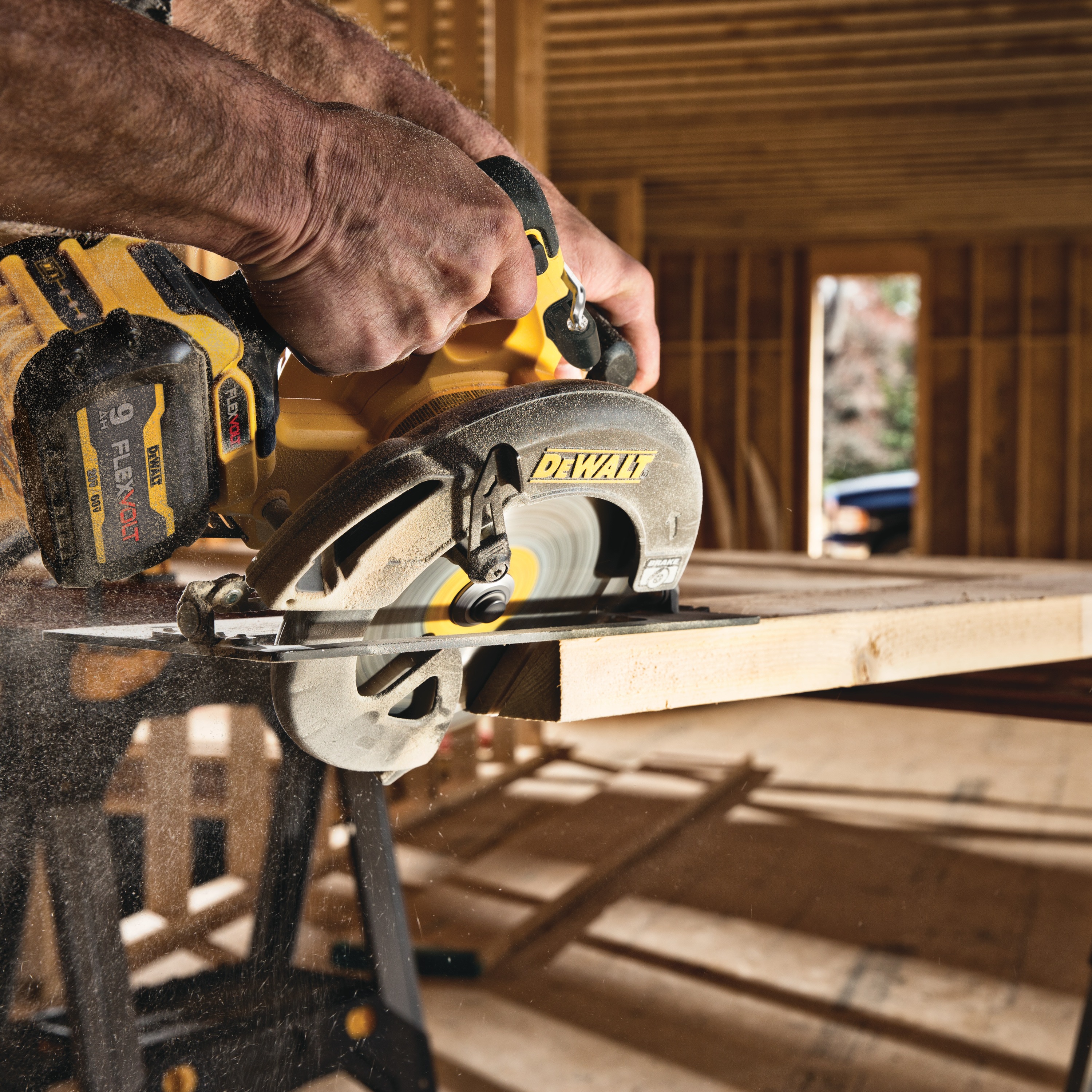 FLEXVOLT brushless cordless circular saw with brake kit cutting wood at an angle.