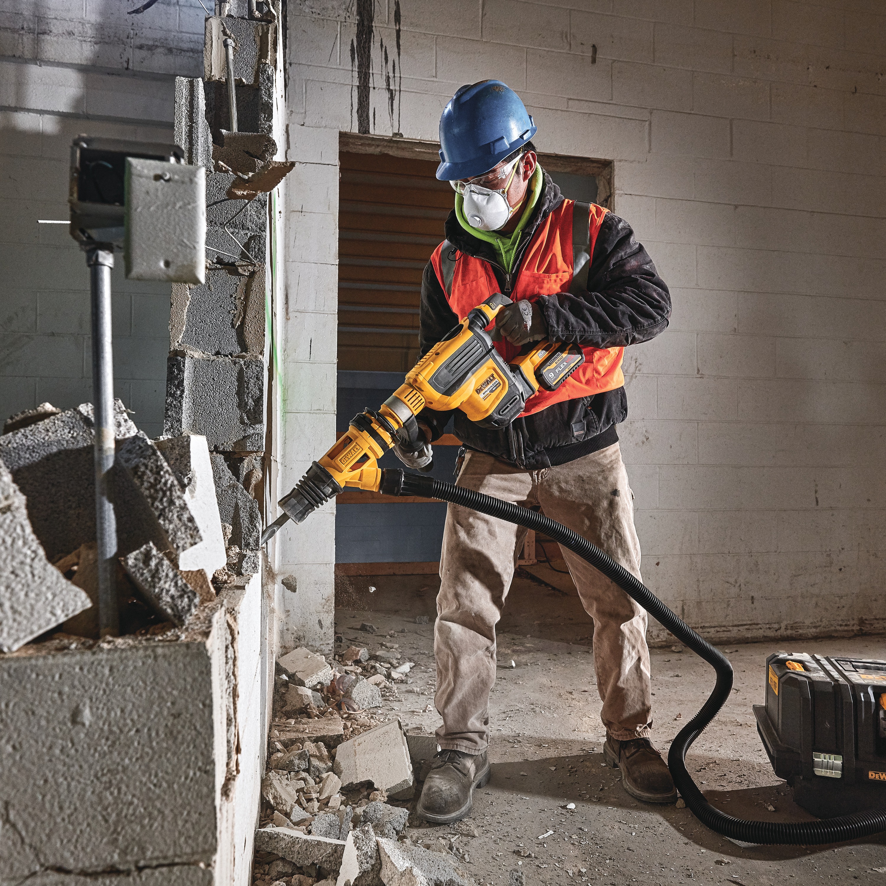 Dust Extractor being used by a workman.