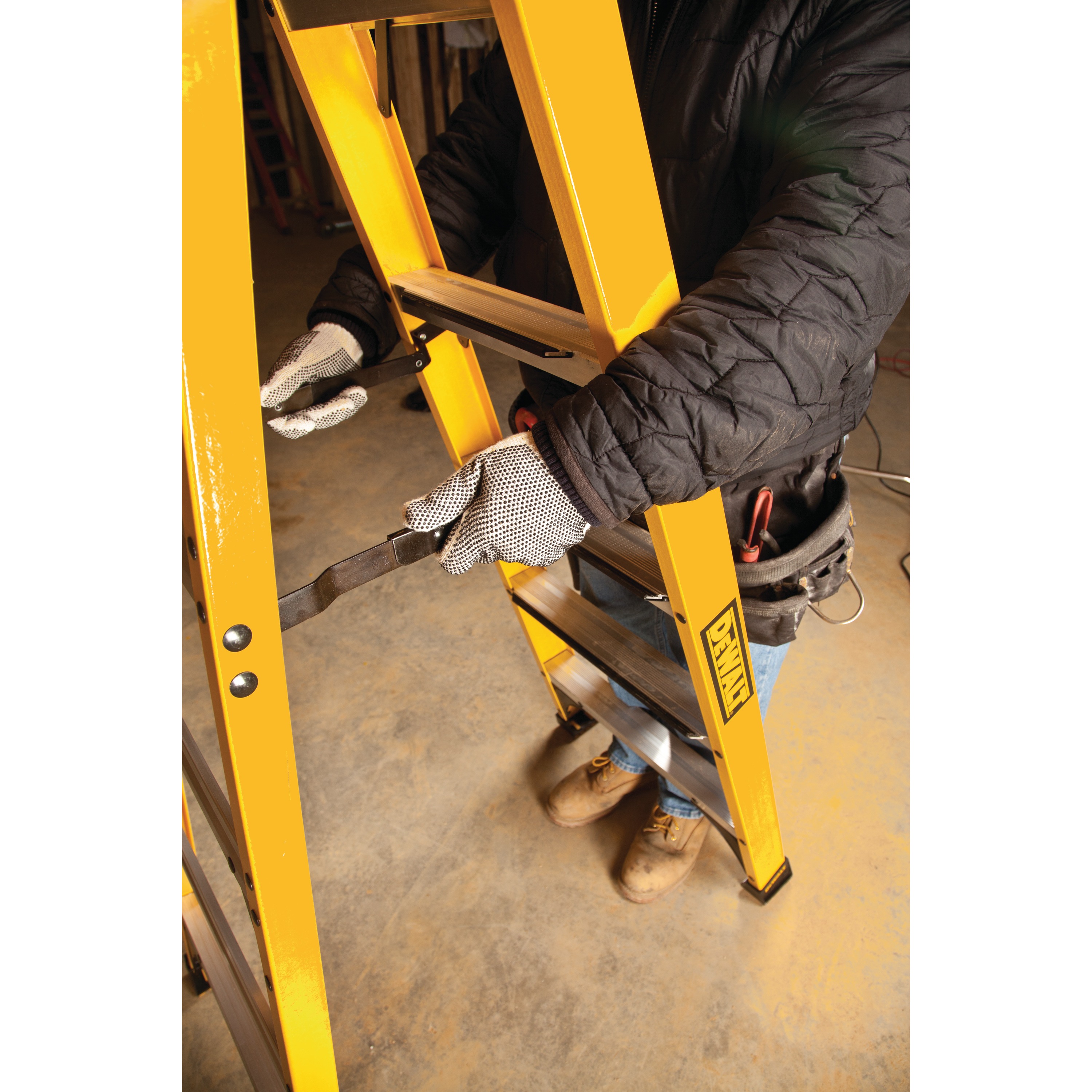 Pinch resistant spreader braces feature of 10 foot Fiberglass Step Ladder 300 pound Load Capacity.