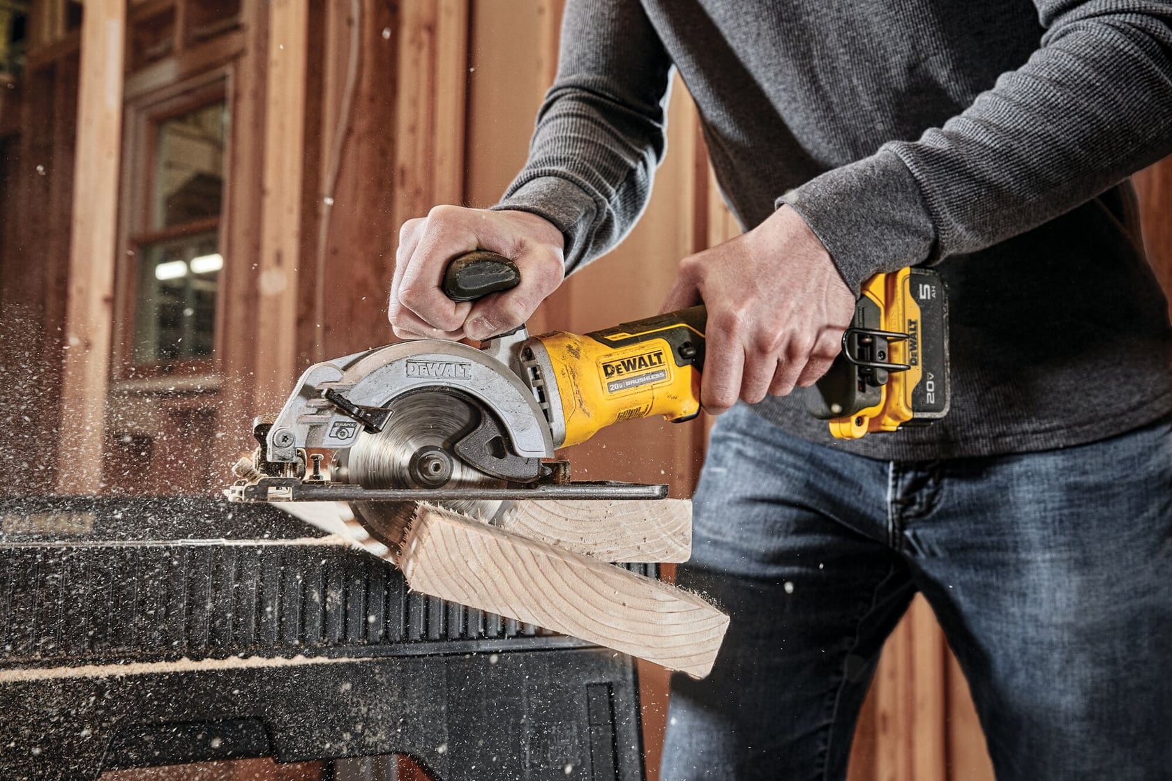 ATOMIC brushless cordless circular saw kit cutting wood.