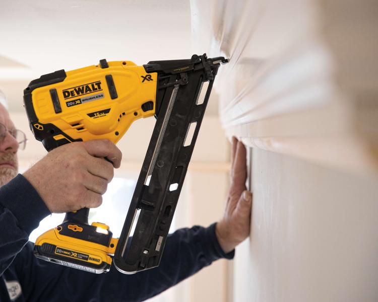 XR Cordless 15 Gauge Angled Finish Nailer in action on a wall