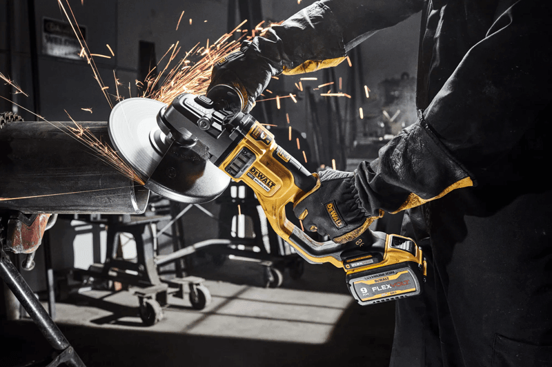 DEWALT worker using the 7 IN. - 9 IN. LARGE ANGLE GRINDER KIT