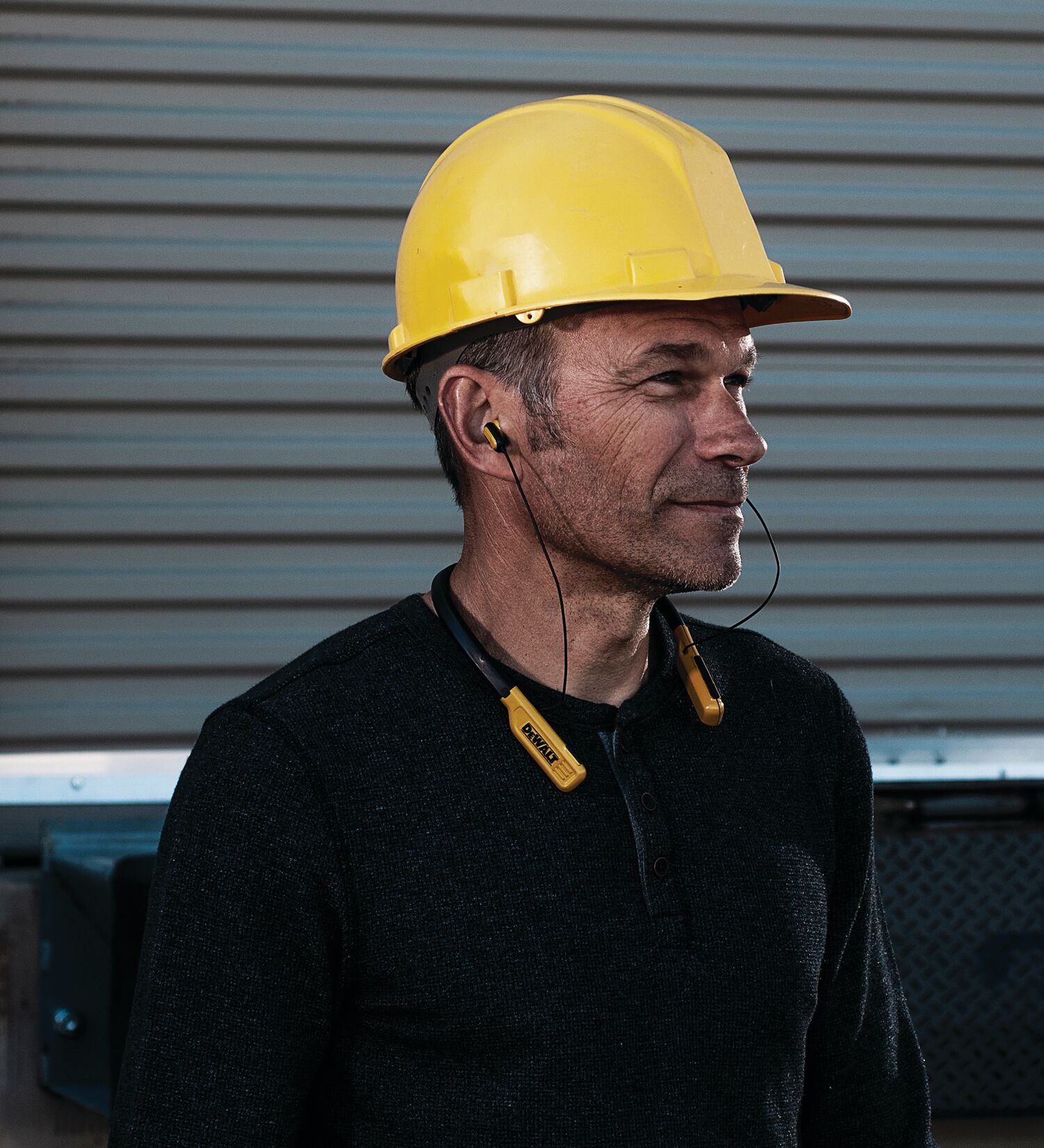 Jobsite Pro Wireless Earphones being used by worker.