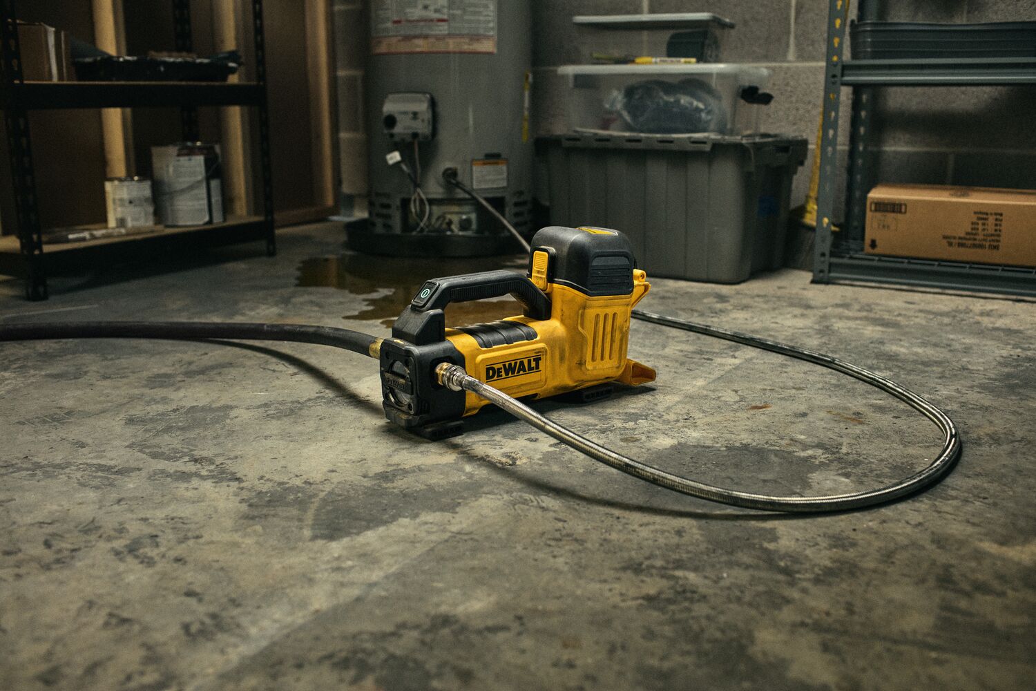 DEWALT Transfer Pump in basement connected to a water heater.