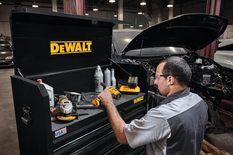 41 inch Wide 6 drawer tool chest being used by a person to kep tool on chest.