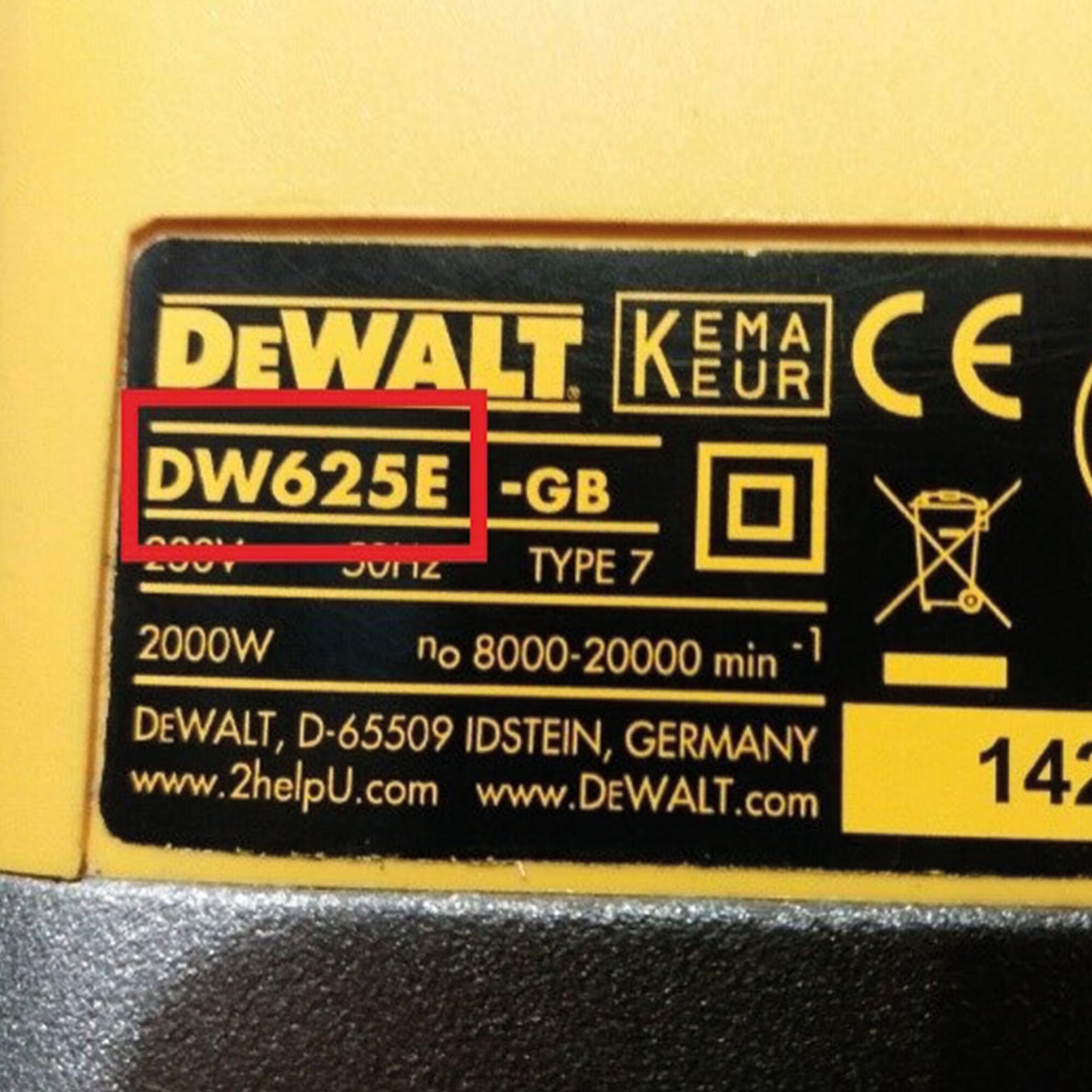 Close-up of a DEWALT product label showing model number DW625E, along with technical specifications and certification marks.