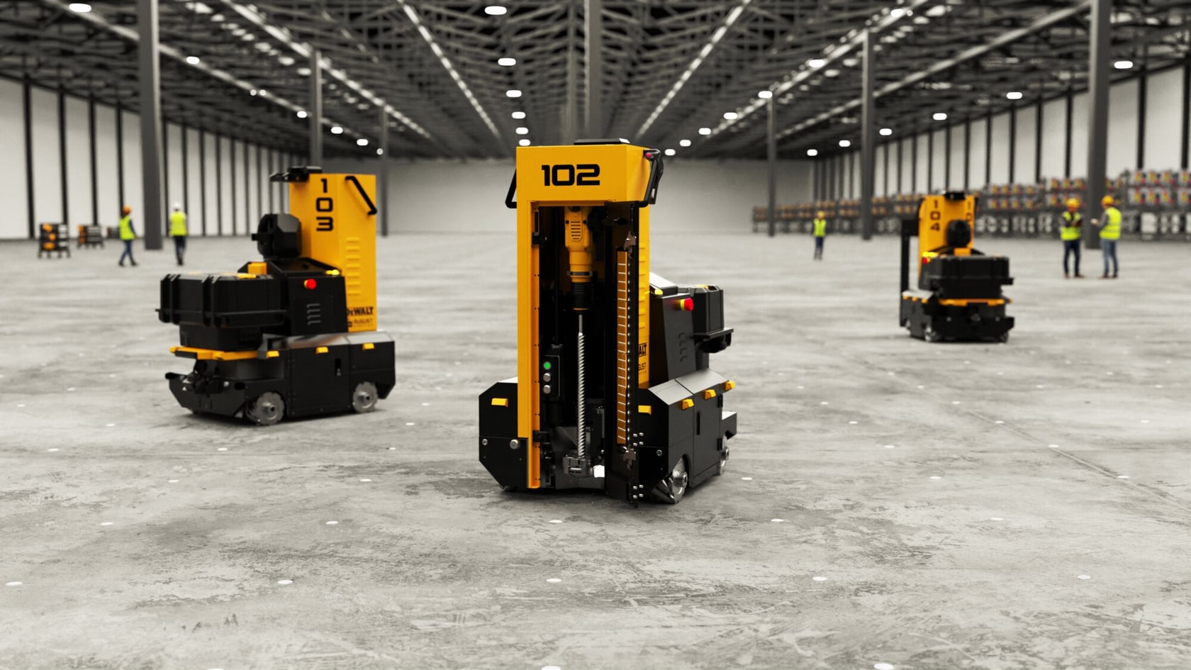 Three yellow and black DEWALT automated machines are positioned on the floor of a large industrial warehouse. The machines are numbered 102, 103, and 104. In the background, several people wearing safety vests are visible, along with rows of shelving.